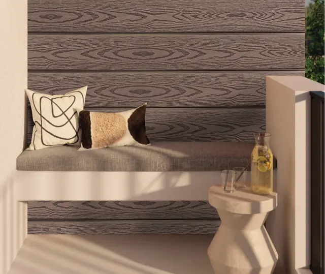 Wall Panel WPC MF-EBONY para exterior, MF Design — Wall panel WPC de acabado que imita la madera, con un tono roble suave y vetas elegantes.